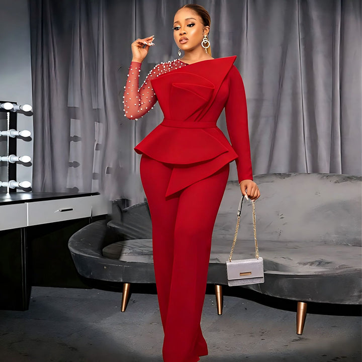 Damer elegant jumpsuit med asymmetrisk överdel och raffinerad volangdesign Mirla-Eva Jonsson