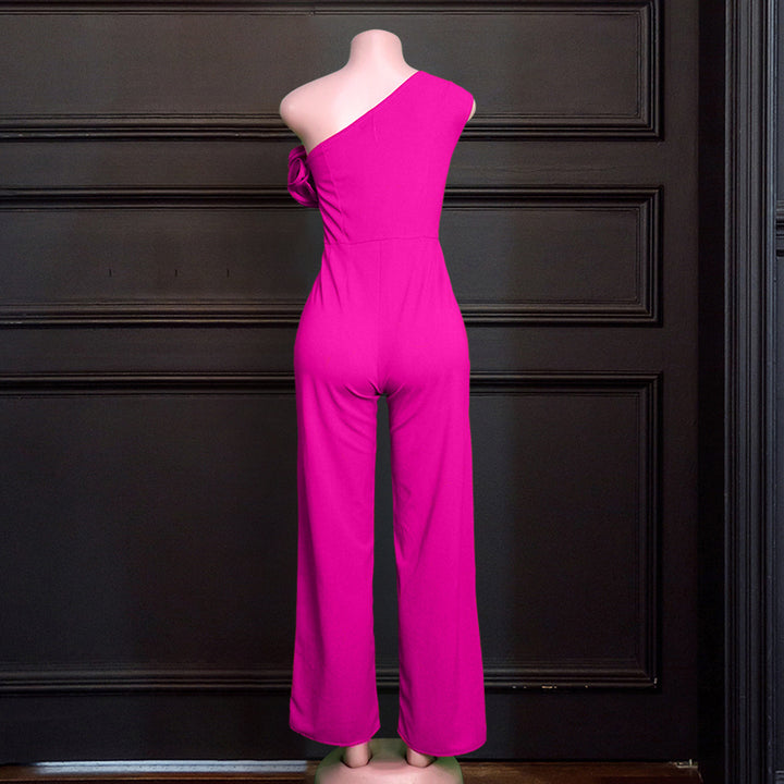 Damer elegant jumpsuit med asymmetrisk skärning och voluminösa ruffledetaljer Mirla-Eva Jonsson