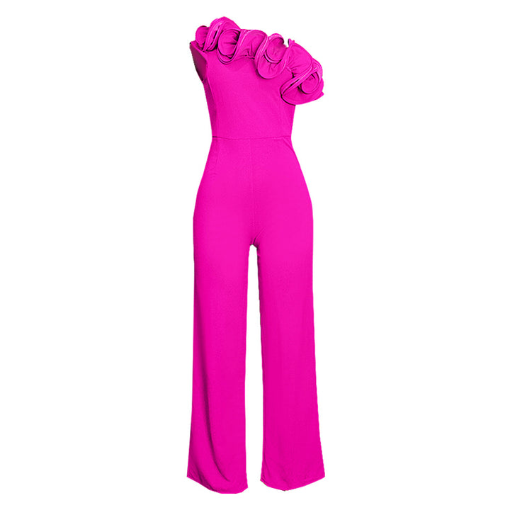 Damer elegant jumpsuit med asymmetrisk skärning och voluminösa ruffledetaljer Mirla-Eva Jonsson