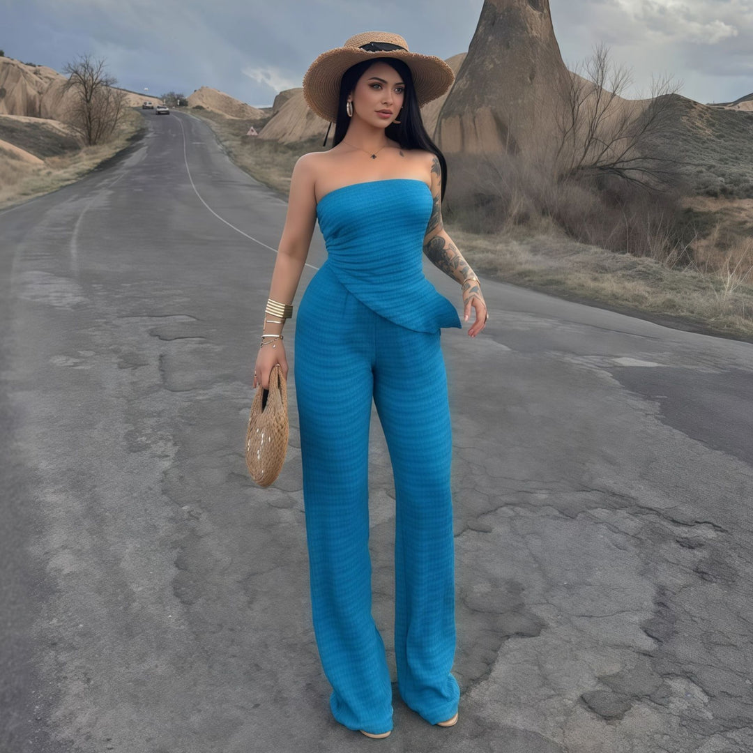 Damer elegant jumpsuit med axelbar design och asymmetrisk fåll Mirla-Eva Jonsson