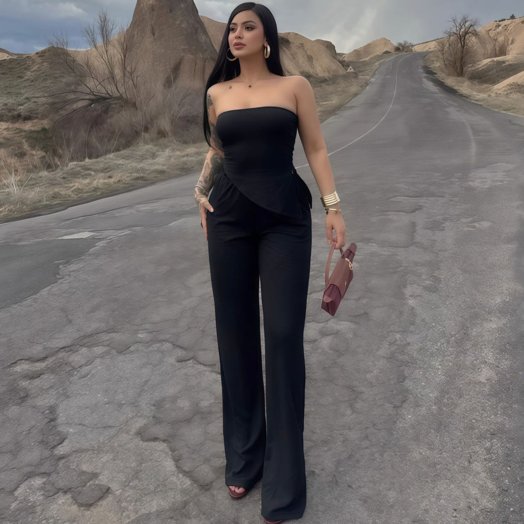 Damer elegant jumpsuit med axelbar design och asymmetrisk fåll Mirla-Eva Jonsson