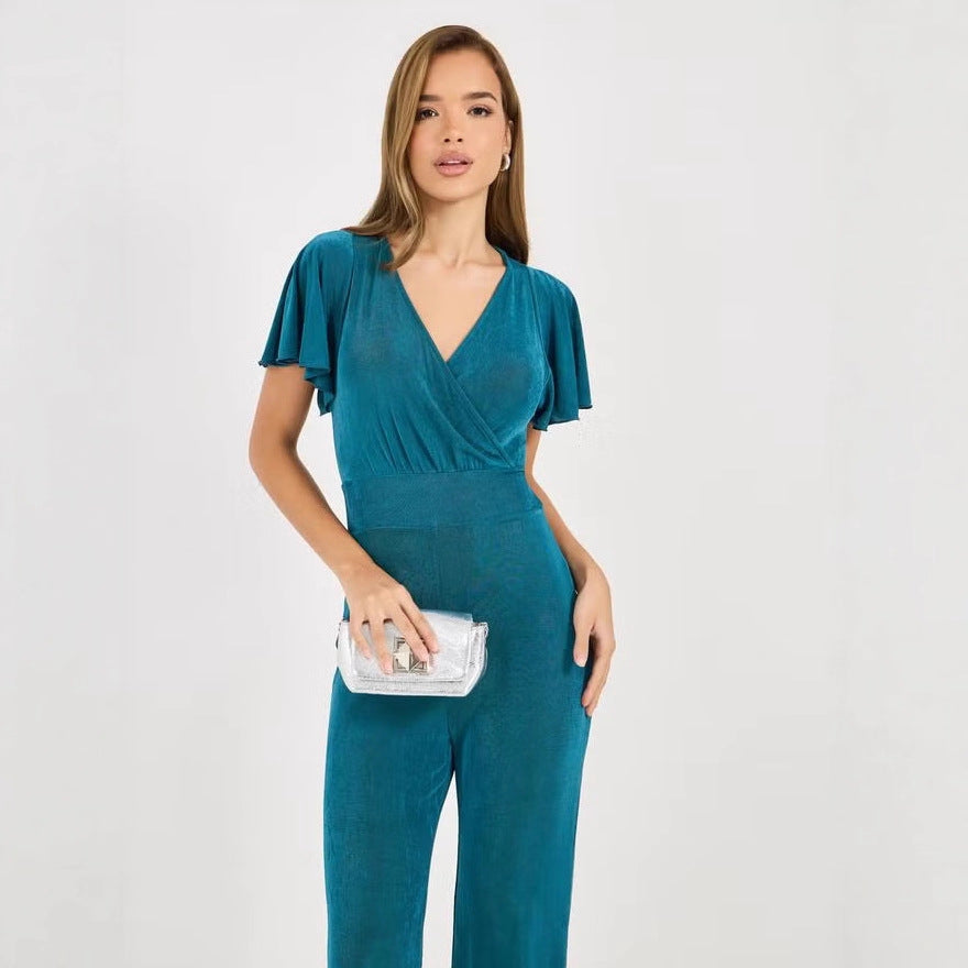Damer elegant jumpsuit med flödande skärning och detaljrika puffärmar Mirla-Eva Jonsson