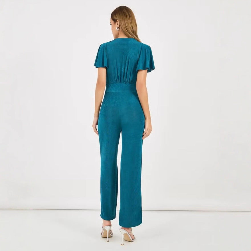 Damer elegant jumpsuit med flödande skärning och detaljrika puffärmar Mirla-Eva Jonsson