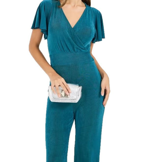 Damer elegant jumpsuit med flödande skärning och detaljrika puffärmar Mirla-Eva Jonsson