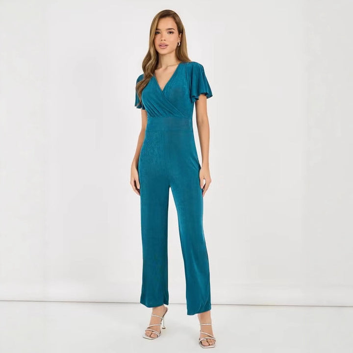 Damer elegant jumpsuit med flödande skärning och detaljrika puffärmar Mirla-Eva Jonsson