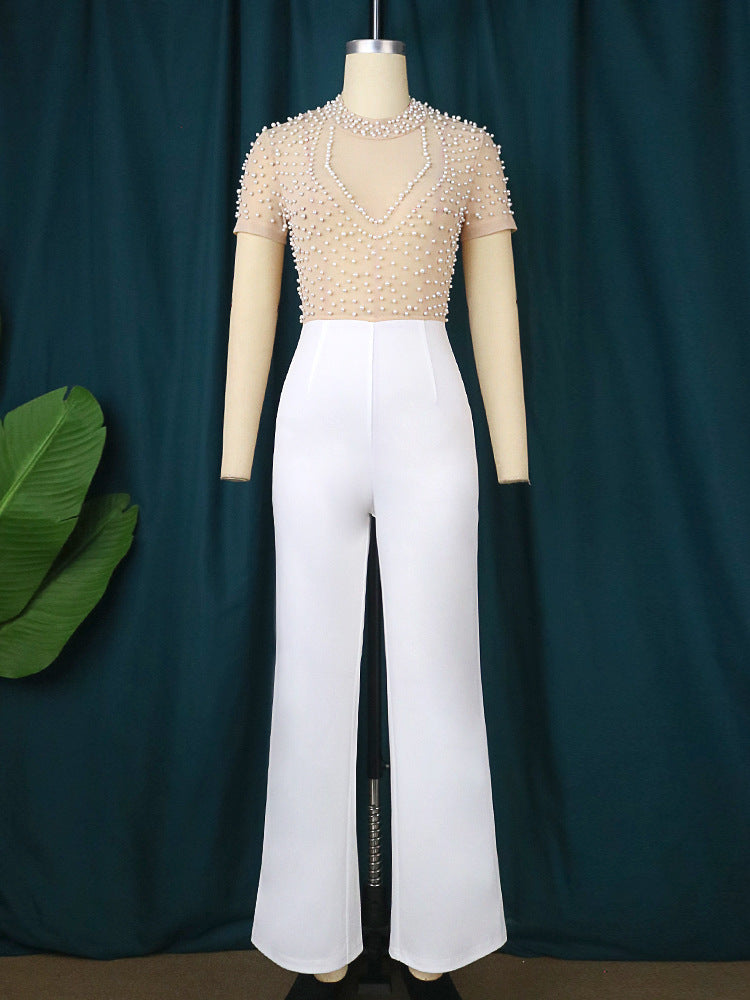 Damer elegant jumpsuit med glittrande pärldetaljer Mirla-Eva Jonsson