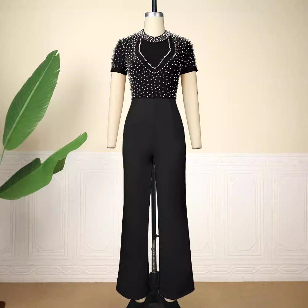 Damer elegant jumpsuit med glittrande pärldetaljer Mirla-Eva Jonsson