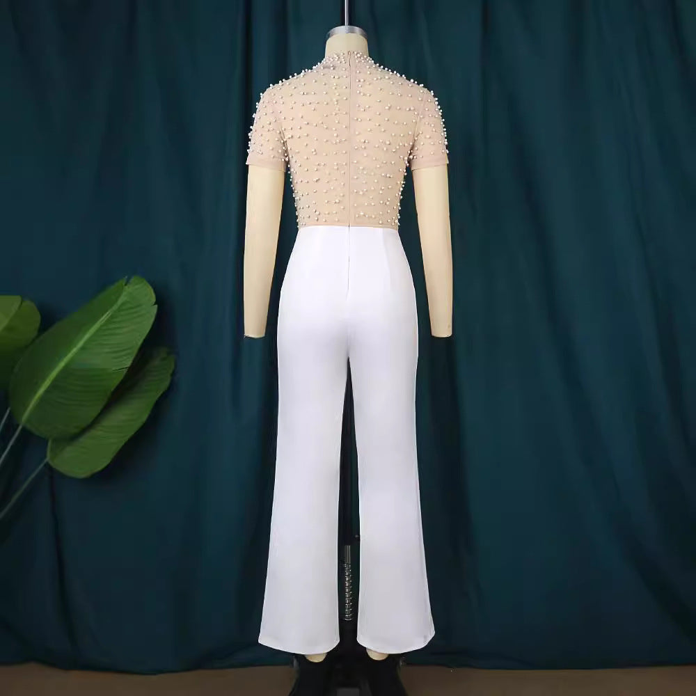 Damer elegant jumpsuit med glittrande pärldetaljer Mirla-Eva Jonsson