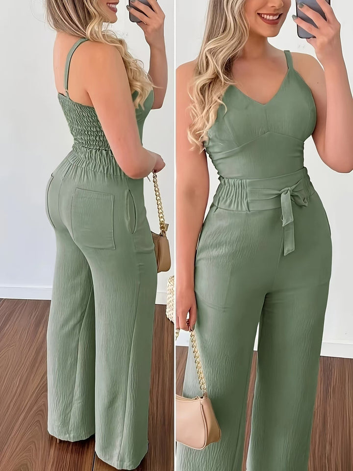 Damer elegant jumpsuit med midjebälte och vida ben Mirla-Eva Jonsson