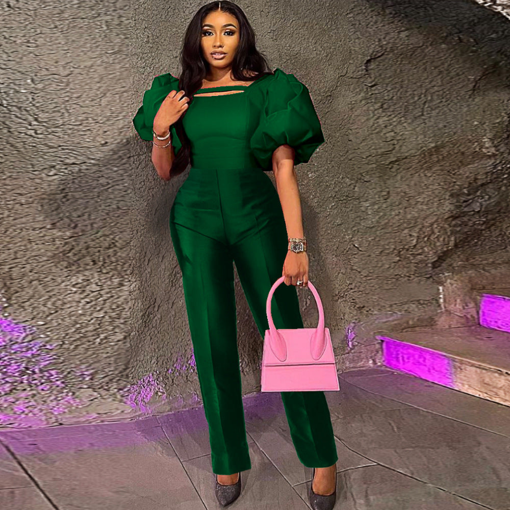 Damer elegant jumpsuit med puffärmar och fyrkantig halsringning Mirla-Eva Jonsson