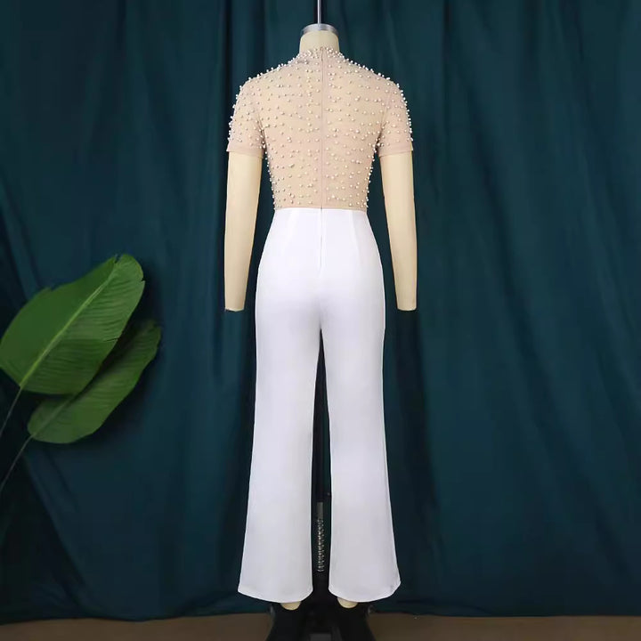 Damer elegant jumpsuit med skimrande pärlbesättning Mirla-Eva Jonsson