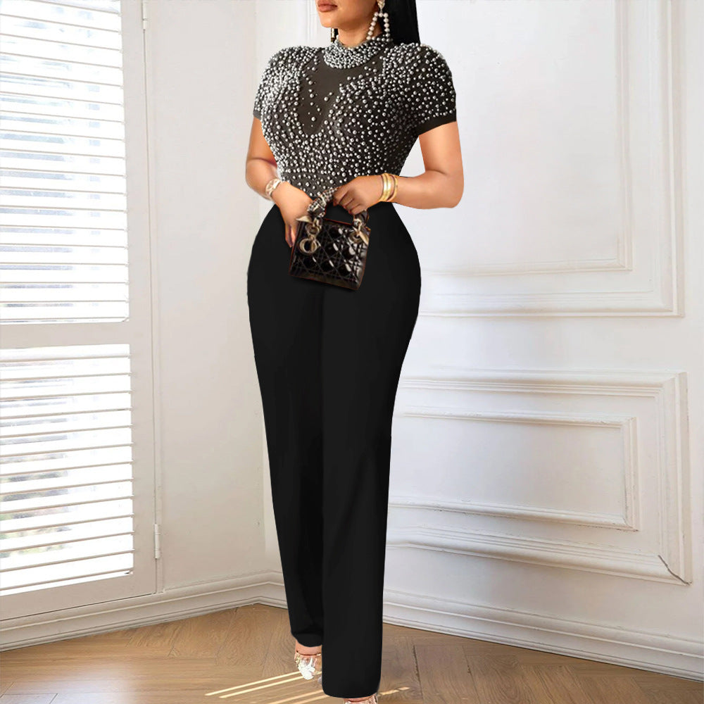 Damer elegant jumpsuit med skimrande pärlbesättning Mirla-Eva Jonsson