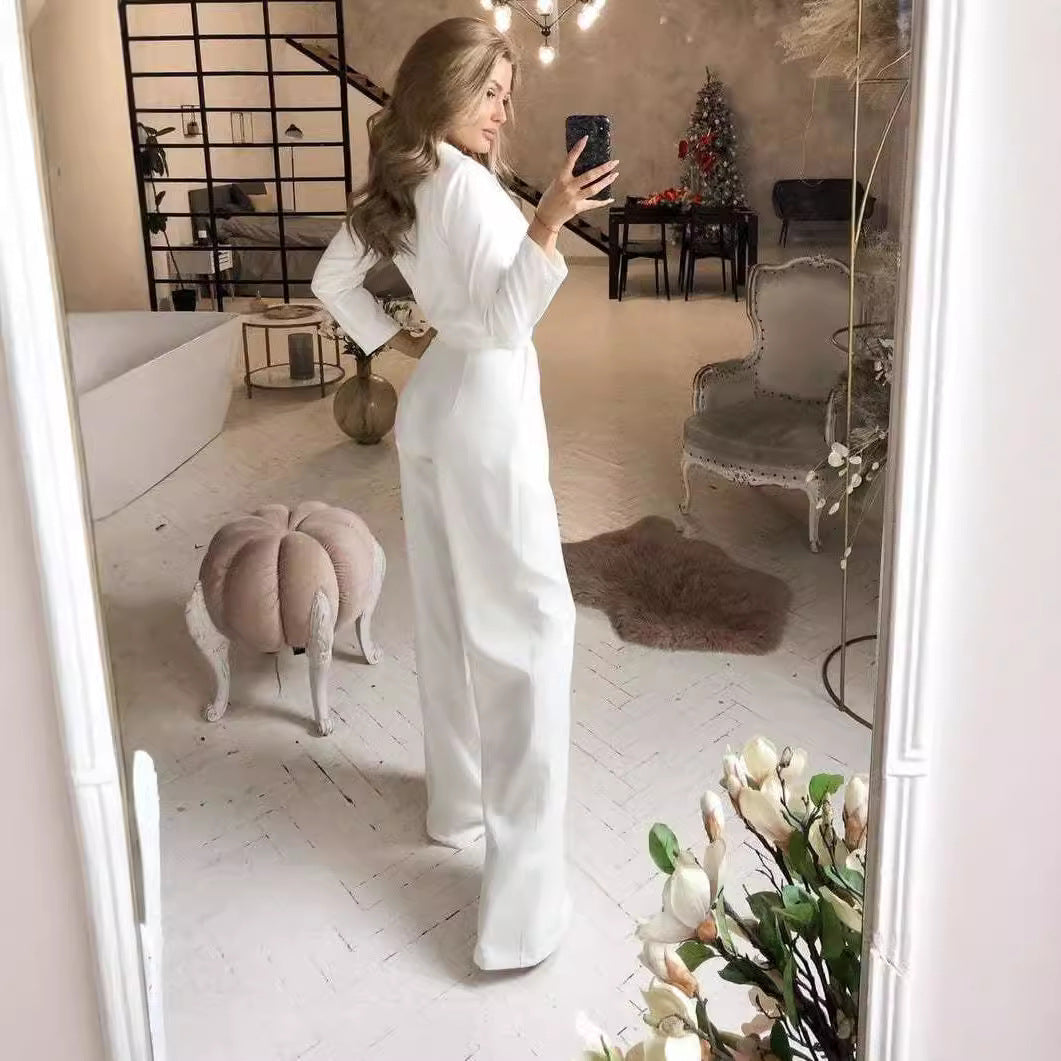 Damer elegant jumpsuit med svängande ben och djup V-ringning Mirla-Eva Jonsson