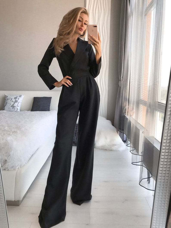 Damer elegant jumpsuit med svängande ben och djup V-ringning Mirla-Eva Jonsson