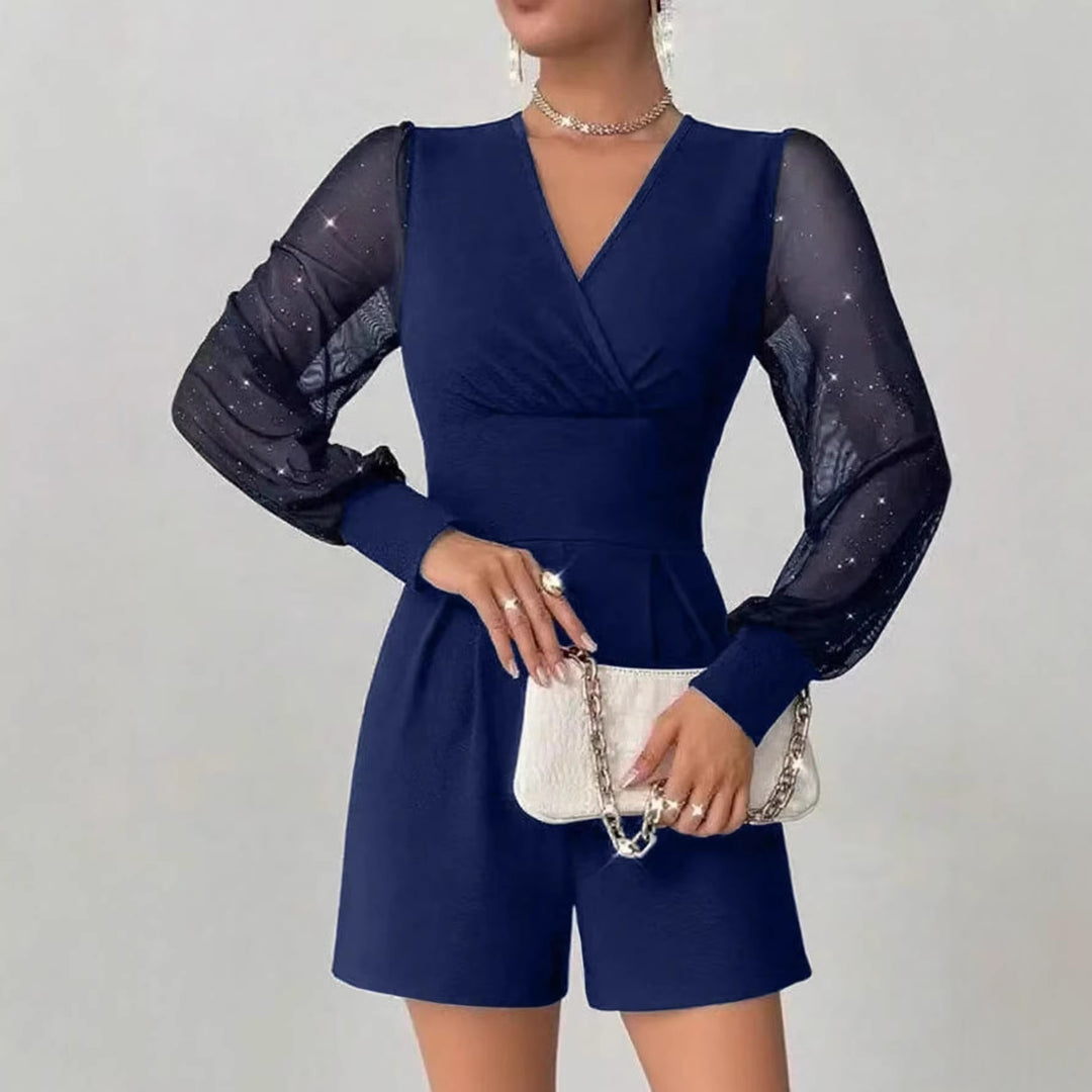 Damer elegant jumpsuit med transparenta puffärmar och V-ringning Mirla-Eva Jonsson