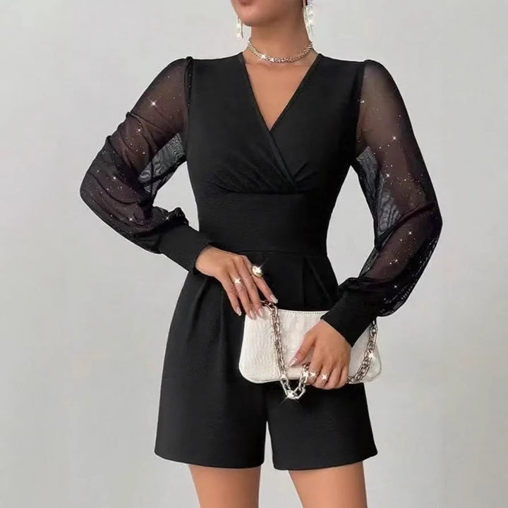 Damer elegant jumpsuit med transparenta puffärmar och V-ringning Mirla-Eva Jonsson