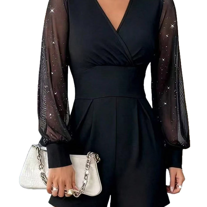 Damer elegant jumpsuit med transparenta puffärmar och V-ringning Mirla-Eva Jonsson