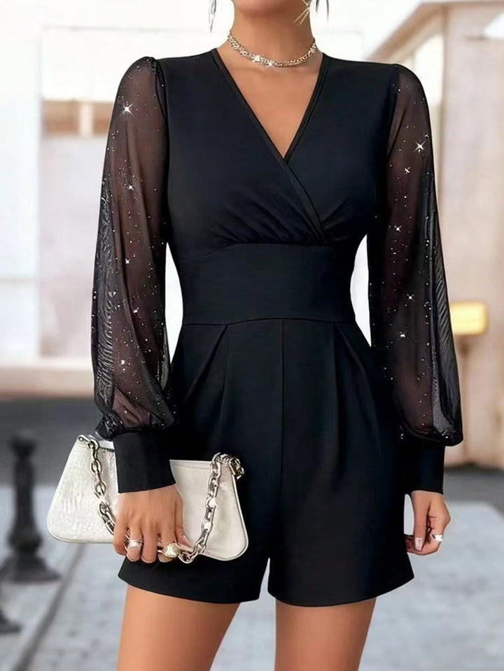 Damer elegant jumpsuit med transparenta puffärmar och V-ringning Mirla-Eva Jonsson