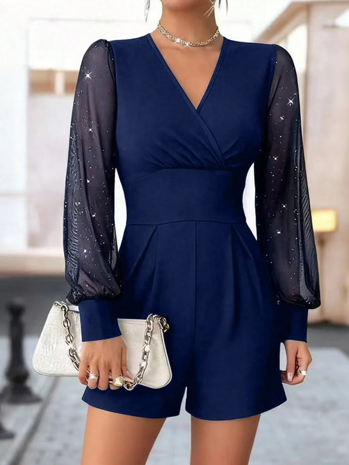 Damer elegant jumpsuit med transparenta puffärmar och V-ringning Mirla-Eva Jonsson