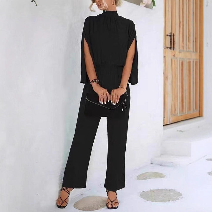 Damer elegant jumpsuit med vida ben och chiffongärmar Mirla-Eva Jonsson
