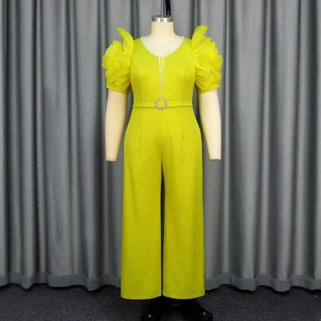 Damer elegant jumpsuit med voluminösa puffärmar och pärlaccent Mirla-Eva Jonsson