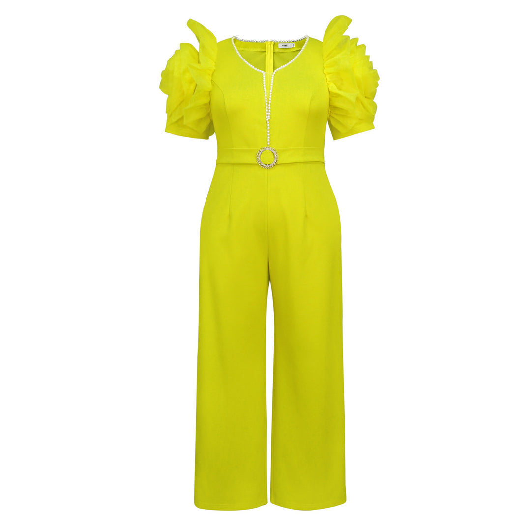 Damer elegant jumpsuit med voluminösa puffärmar och pärlaccent Mirla-Eva Jonsson