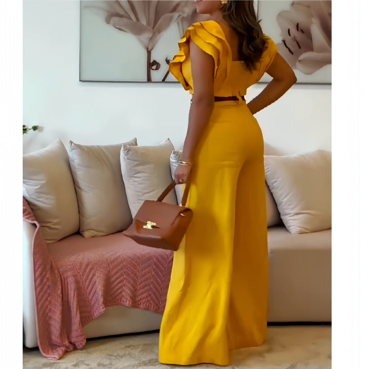 Damer elegant jumpsuit med voluminösa volangdetaljer Mirla-Eva Jonsson