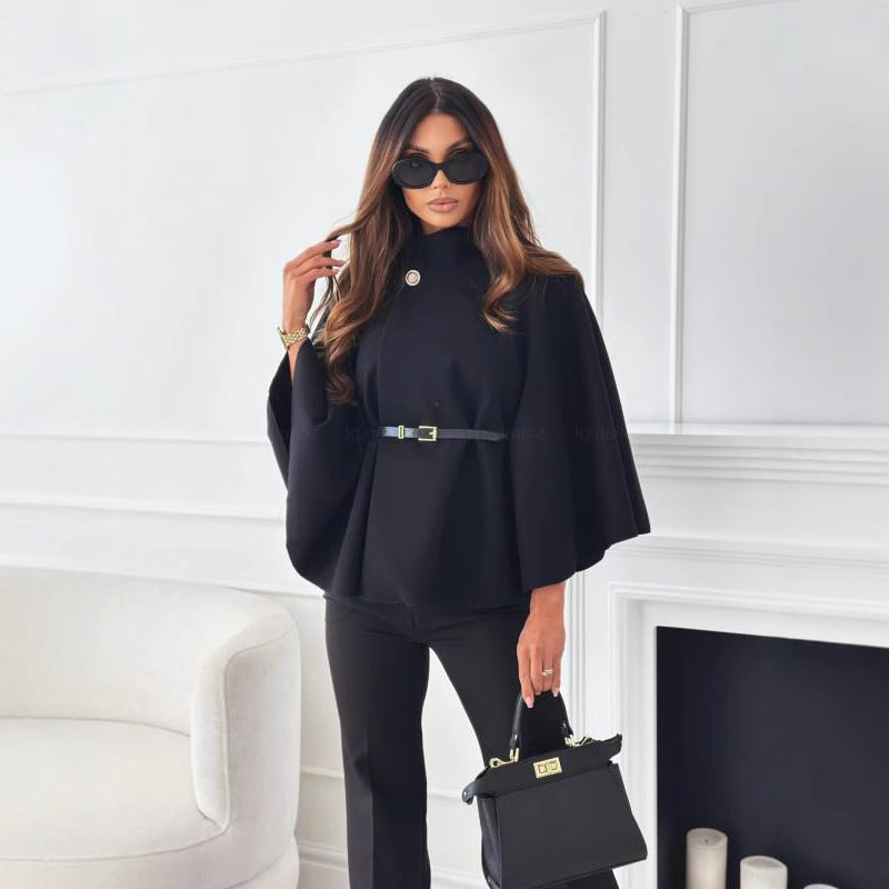 Damer elegant kappa-blus med veckat design och figursydd bälte Mirla-Eva Jonsson