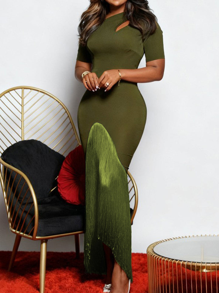 Damer elegant klänning med asymmetrisk nederkant och modernt cut-out Mirla-Eva Jonsson