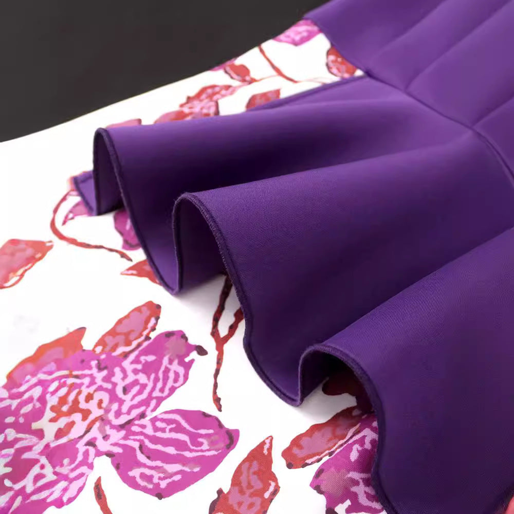 Damer elegant klänning med asymmetrisk volangdesign och blommönster Mirla-Eva Jonsson