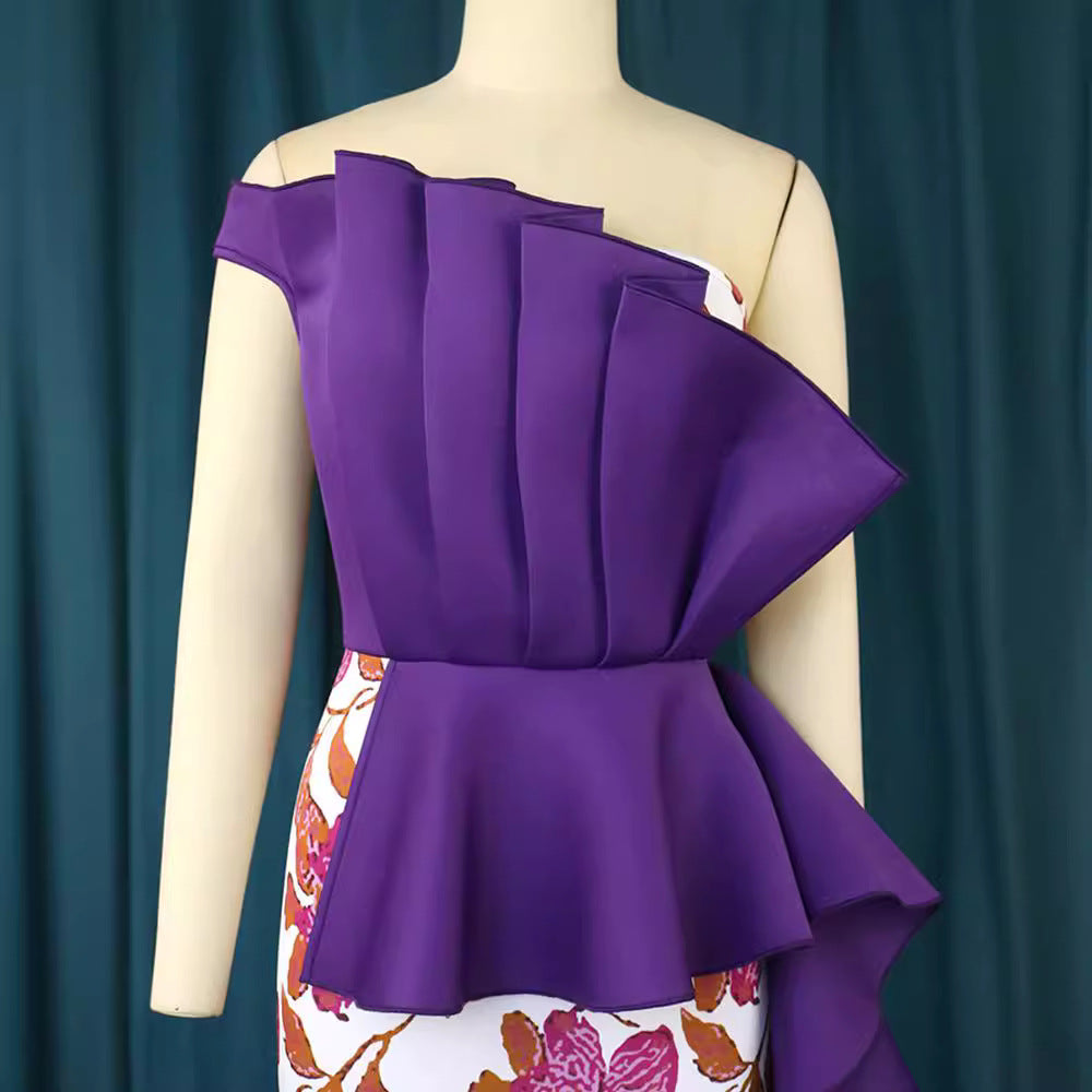 Damer elegant klänning med asymmetrisk volangdesign och blommönster Mirla-Eva Jonsson