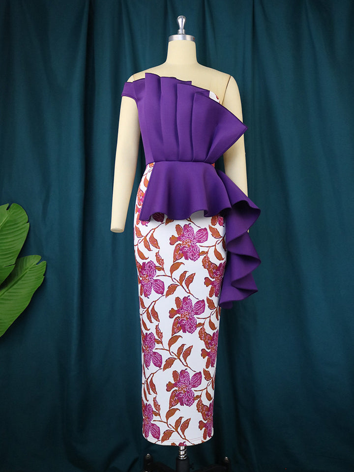 Damer elegant klänning med asymmetrisk volangdesign och blommönster Mirla-Eva Jonsson