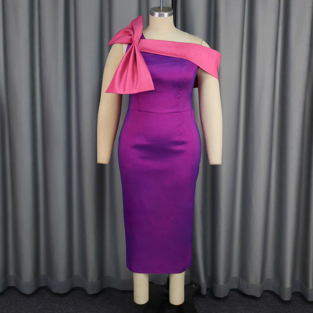 Damer elegant klänning med asymmetrisk volangdetalj Mirla-Eva Jonsson