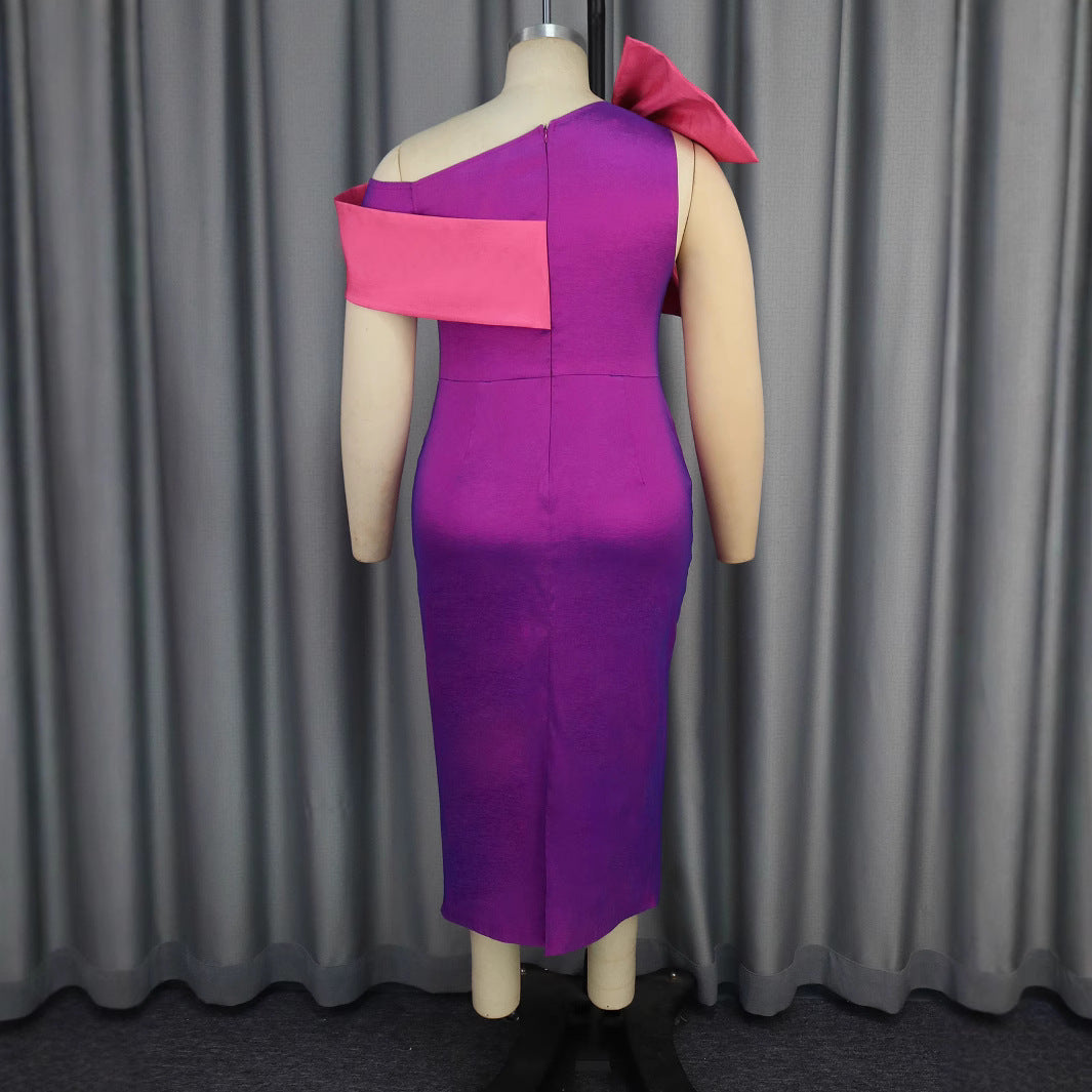 Damer elegant klänning med asymmetrisk volangdetalj Mirla-Eva Jonsson