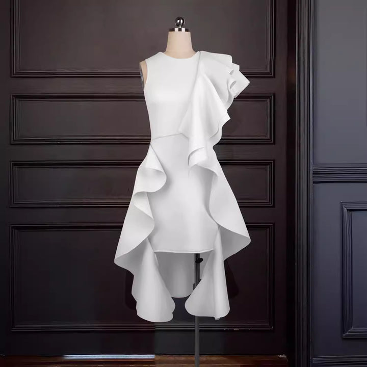 Damer elegant klänning med asymmetriska volanger Mirla-Eva Jonsson