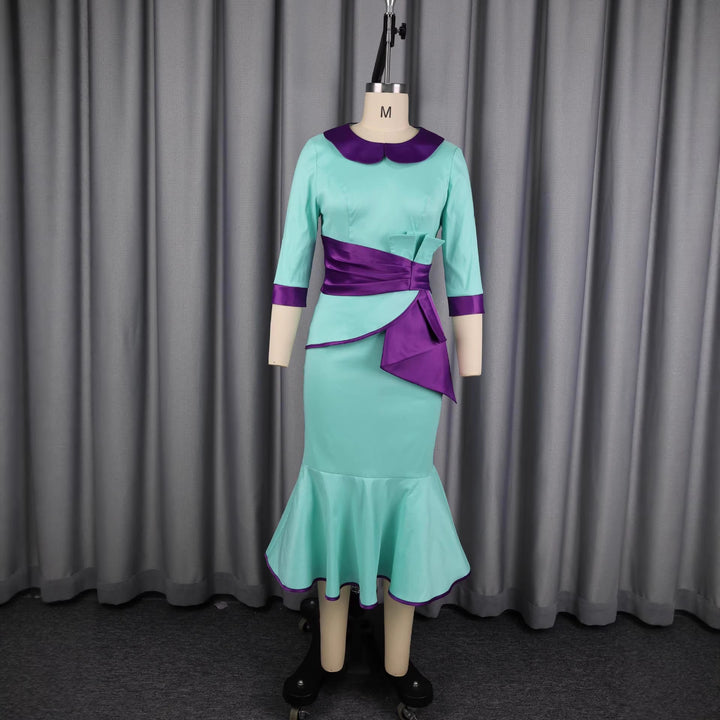 Damer elegant klänning med moderiktig krage och asymmetrisk midjedetalj Mirla-Eva Jonsson