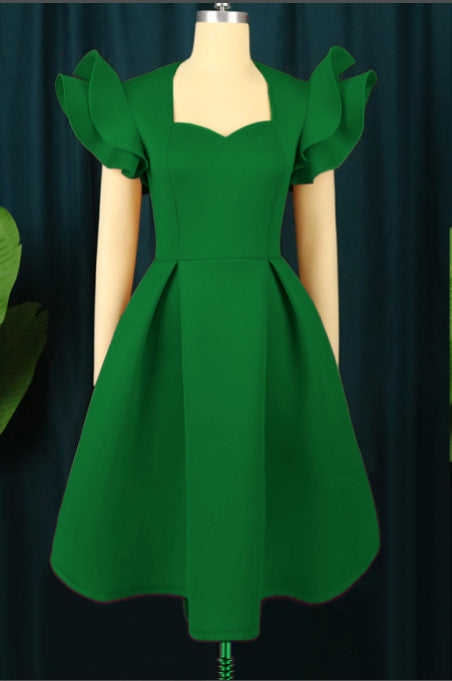 Damer elegant klänning med voluminösa volanger-Eva Jonsson