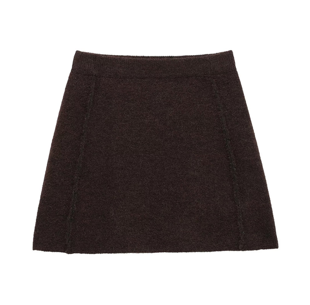 Damer elegant, kort stickad kjol med hög midja och sidofickor Mirla-Eva Jonsson