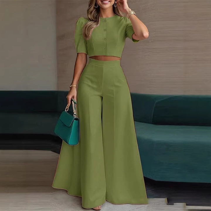 Damer elegant kort topp med puffärmar och högskurna palazzobyxor Mirla-Eva Jonsson
