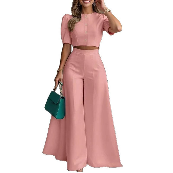 Damer elegant kort topp med puffärmar och högskurna palazzobyxor Mirla-Eva Jonsson