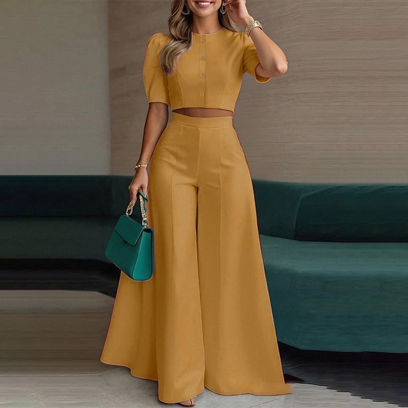 Damer elegant kort topp med puffärmar och högskurna palazzobyxor Mirla-Eva Jonsson