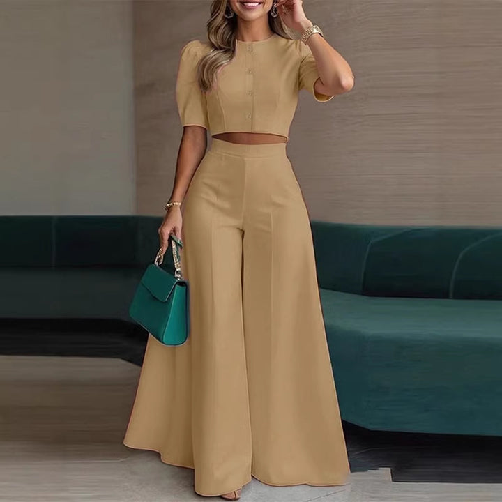 Damer elegant kort topp med puffärmar och högskurna palazzobyxor Mirla-Eva Jonsson