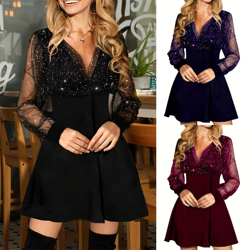 Damer elegant kortärmad klänning med transparenta ärmar och glittrande detalj Mirla-Eva Jonsson