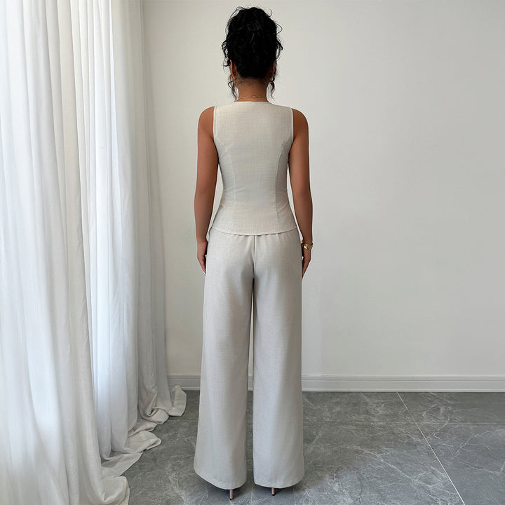 Damer elegant kostymbyxor med figursytt överdel och knapppdetaljer Mirla-Eva Jonsson