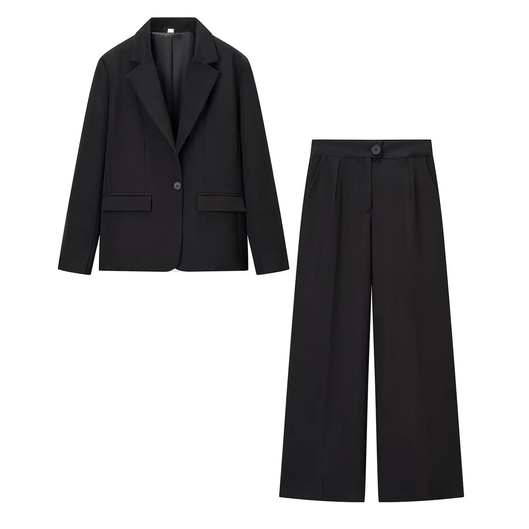 Damer elegant kostymset med figursydd blazer och vida byxor Mirla-Eva Jonsson