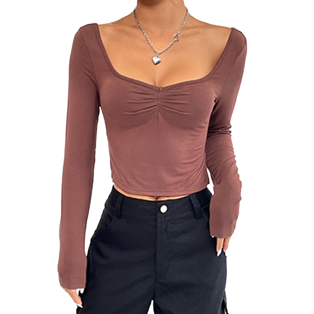 Damer elegant långärmad crop top med stilfull samlingseffekt Mirla-Eva Jonsson