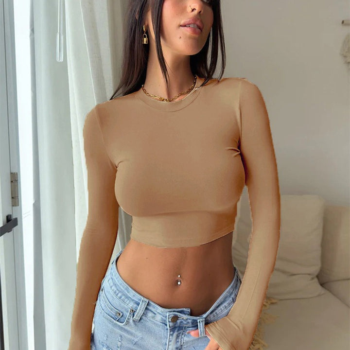 Damer elegant långärmad crop topp i hudvänligt material Mirla-Eva Jonsson
