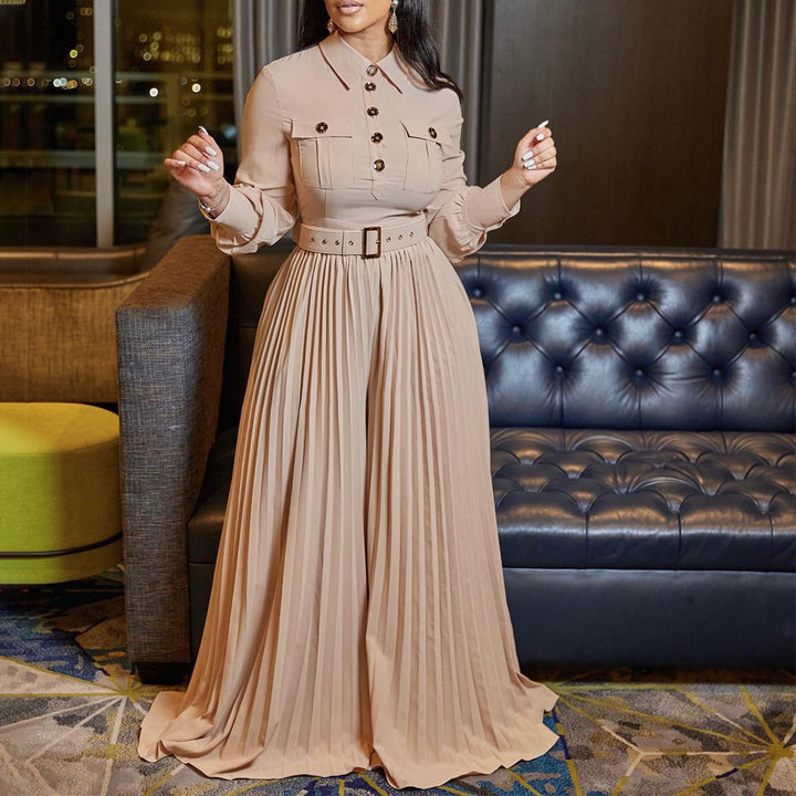 Damer elegant långärmad jumpsuit med figursydd bälte och plisserad design Mirla-Eva Jonsson