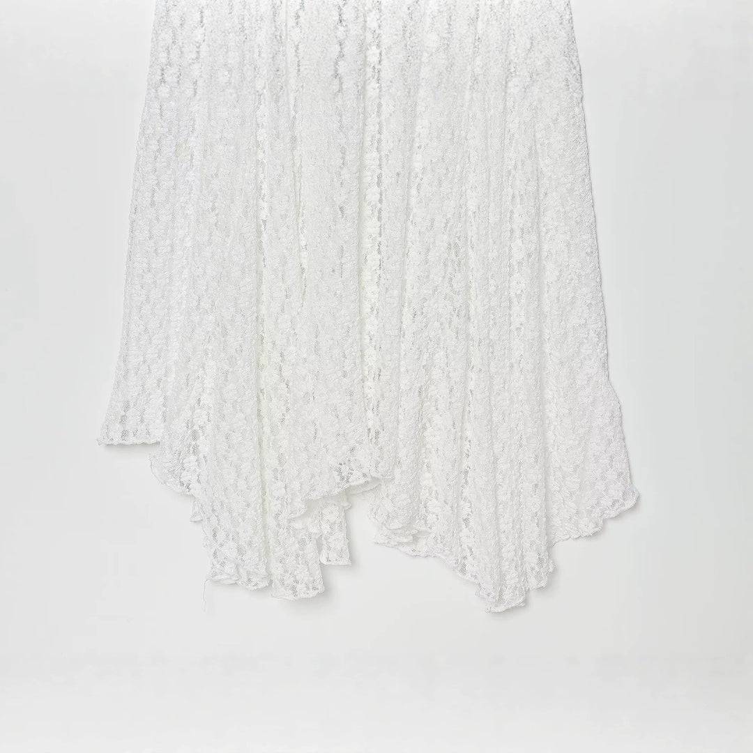 Damer elegant långärmad klänning med asymmetrisk fåll och fina texturer Mirla-Eva Jonsson