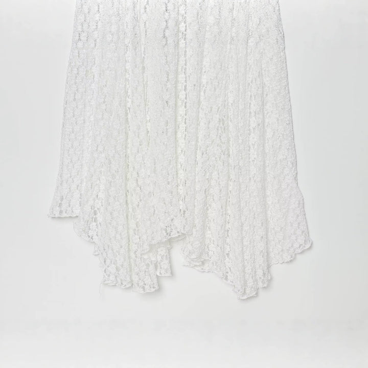 Damer elegant långärmad klänning med asymmetrisk fåll och fina texturer Mirla-Eva Jonsson